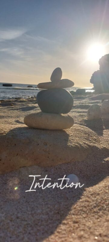 stacked rocks on a beach